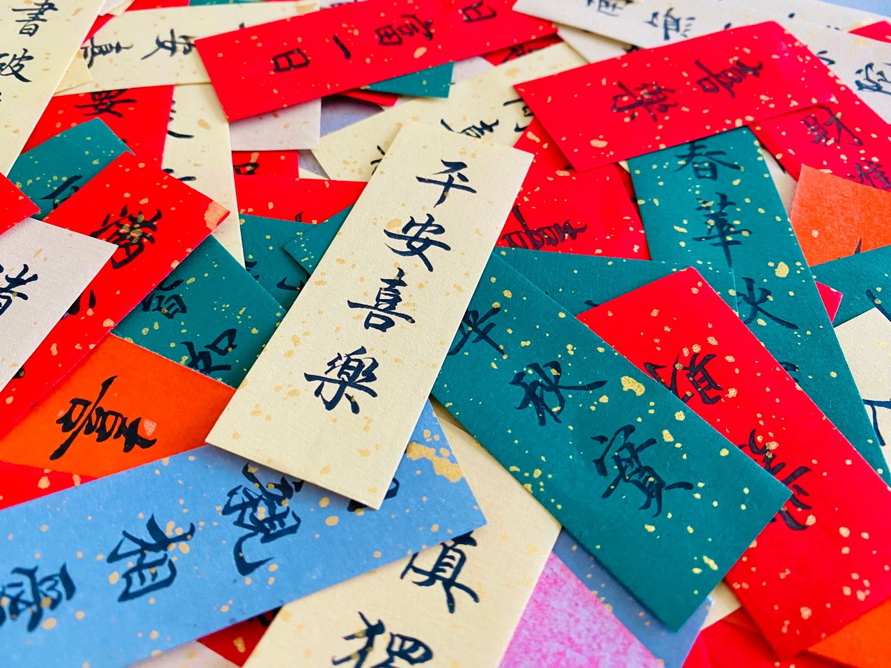 Colorful Chinese calligraphy bookmarks red green paper strips traditional writing auspicious characters gift