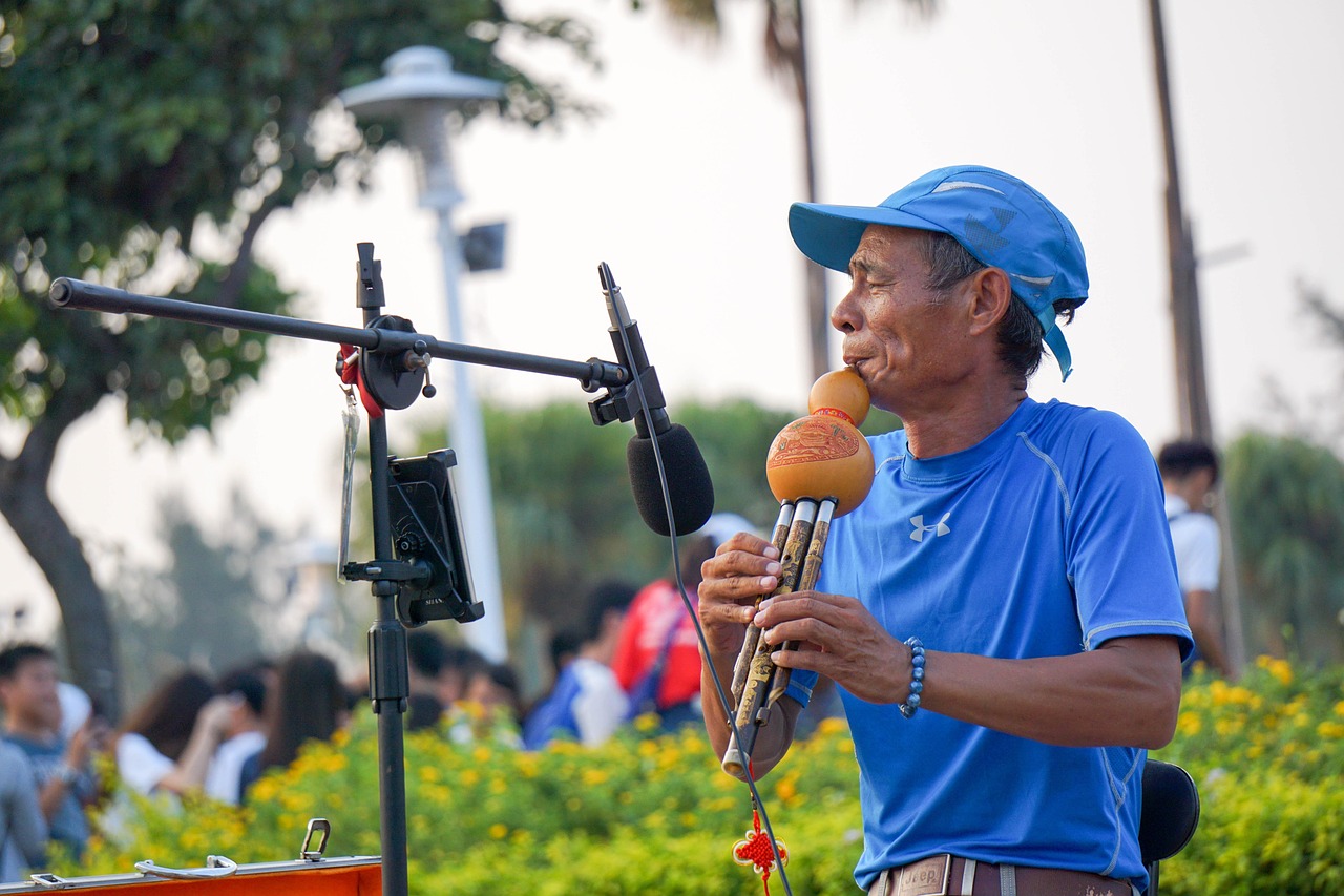 Traditional Chinese hulusi cucurbit gourd flute musician performing